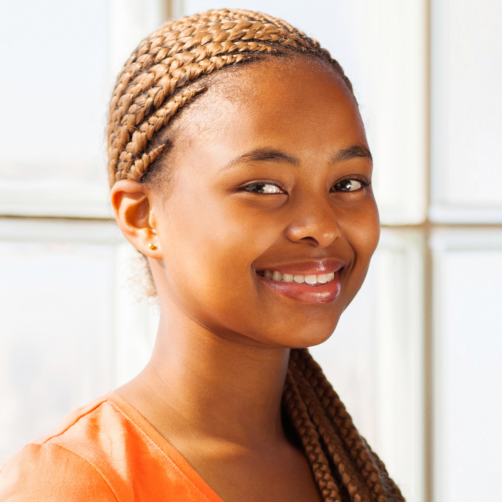 smiling african college friends on campus